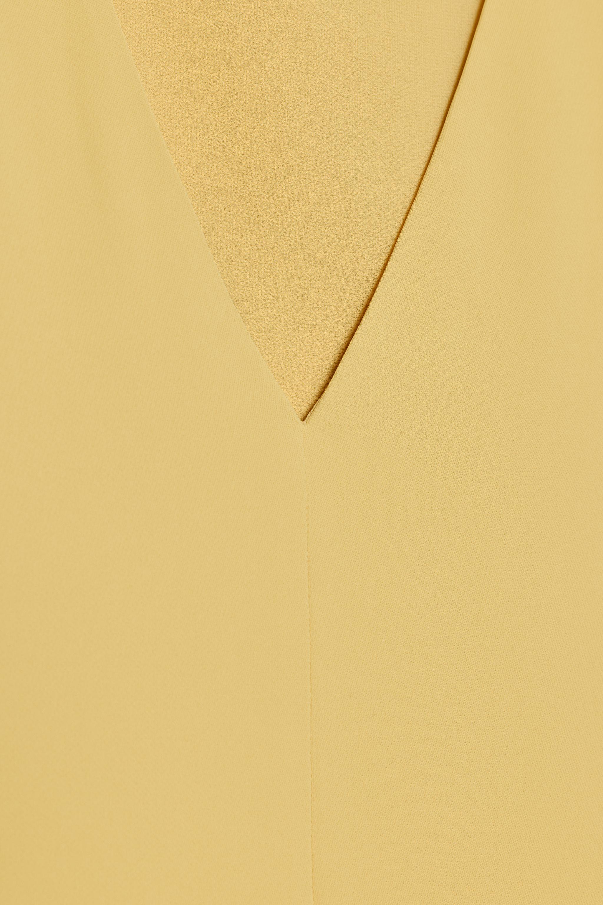ROBE MI-LONGUE UNIE SANS MANCHES